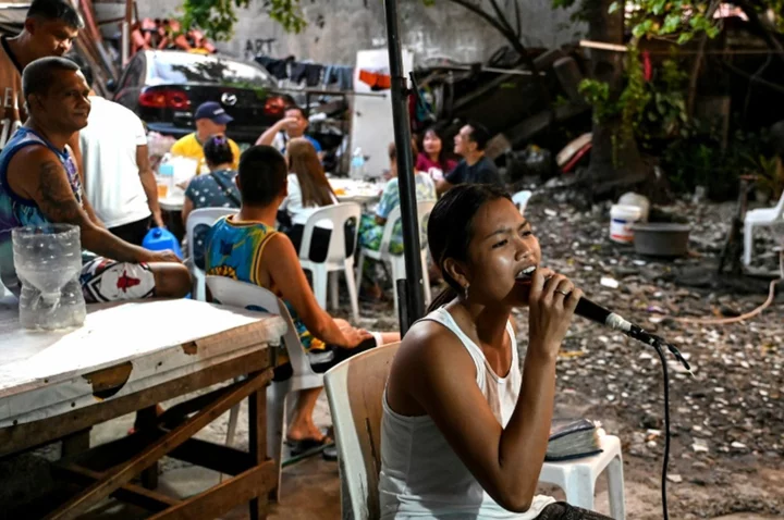 'We love singing': Filipinos find joy in karaoke