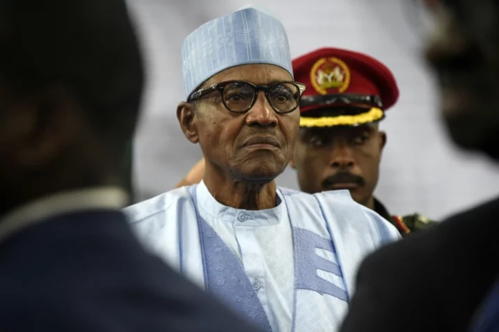 Nigeria's departing President Buhari defends legacy