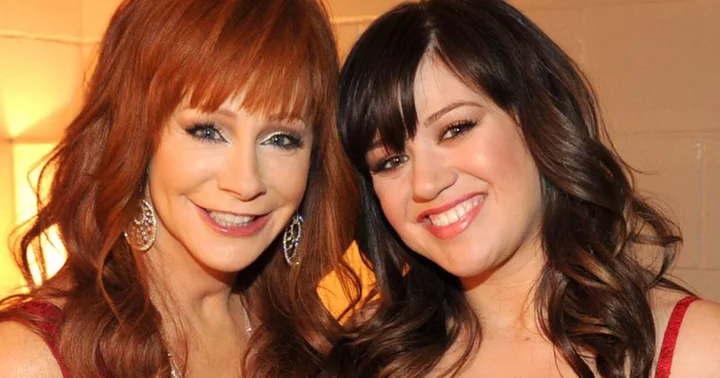 Kelly Clarkson recalls the time she hid a creepy doll in stepmother-in-law Reba McEntire's closet, says 'it scared me'