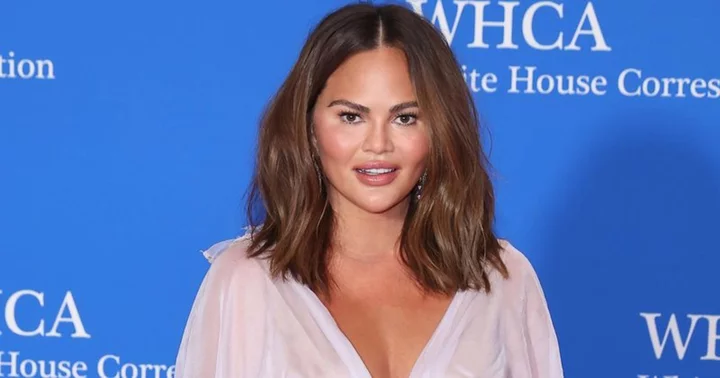 Chrissy Teigen hits back at trolls claiming she has a 'new face' due to 'overfill': 'I gained weight'