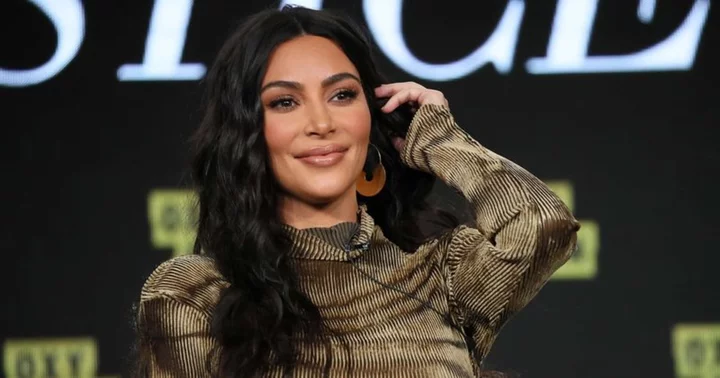 Kim Kardashian admits prefering 'lights out' in the bedroom but fans believe the 'sextape says otherwise'