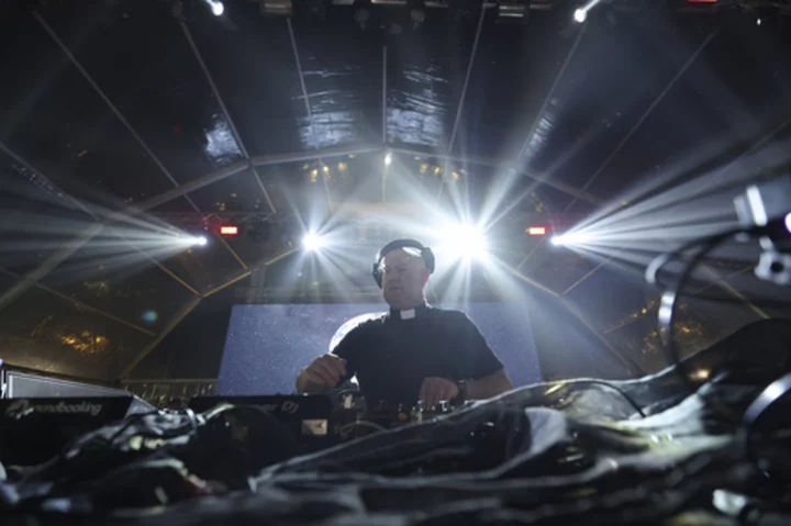 As a DJ, village priest in Portugal cues up faith and electronic dance music for global youth